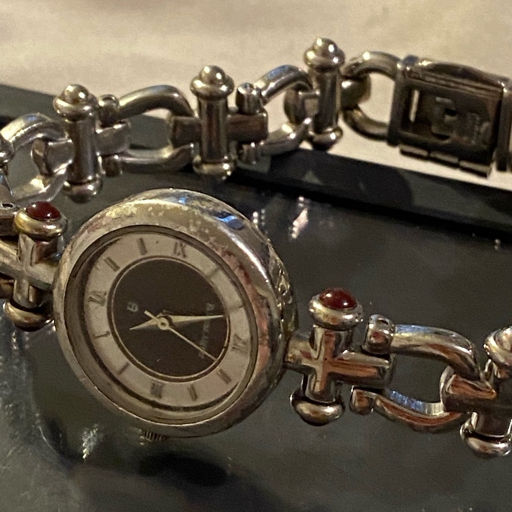 Etienne Aigner watch with ruby accent